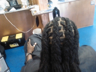 dreadlocks i did cornrowed back and some left loose